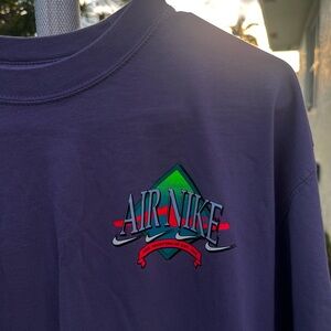 Nike Air Tee in Deep Purple with Graphic Logo